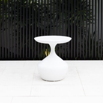 Ubud Outdoor Coffee Table featuring hourglass silhouette and seamless powder-coated aluminium design, shown in White, Charcoal, Rust and Green for modern outdoor styling.