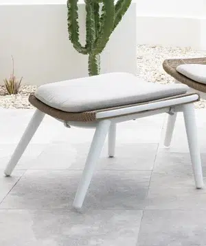 Arona Ottoman with powder coated aluminium frame, woven HDPE wicker detailing and cushioned top designed to pair with the Arona Rocking Chair