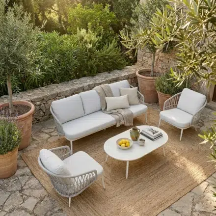Ayana 4 Piece Outdoor Sofa Setting with white powder-coated aluminium frame, linen rope look wicker detailing, Sunproof Olefin cushions and matching round outdoor coffee table.