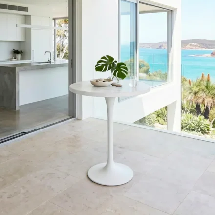 Verona Sintered Stone Outdoor Bar Table with round sintered stone top and curved aluminium pedestal base