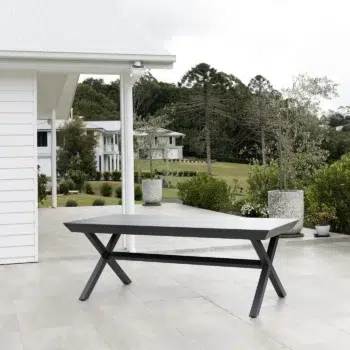 Tropea Extension Medium Outdoor Table with powder-coated aluminium frame and slatted tabletop, available in White and Charcoal, styled for modern outdoor entertaining.