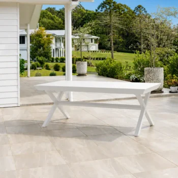 Tropea Extension Medium Outdoor Table with powder-coated aluminium frame and slatted tabletop, available in White and Charcoal, styled for modern outdoor entertaining.
