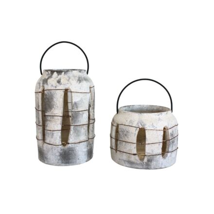 Ceramic Claymoor Wire Wrap Lantern in White/Grey displayed with a lit candle on an outdoor wooden table