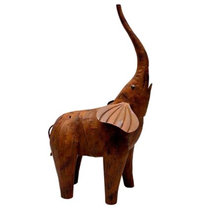Metal Rust Elephant Statue measuring 40.5x19x67.5cm featuring a durable iron body and textured rust finish