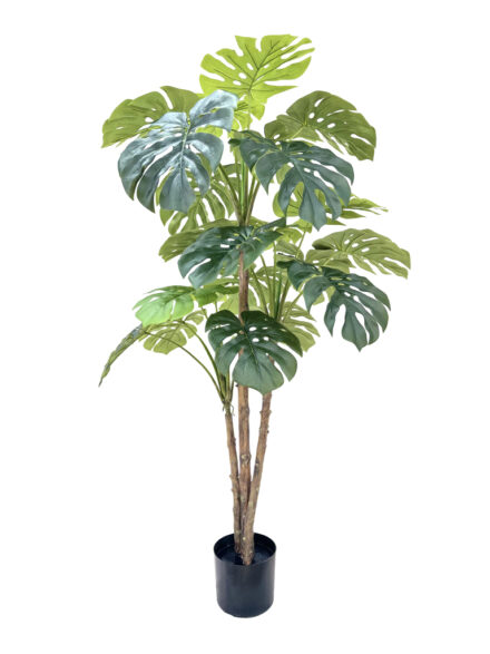 Plant Monsteria featuring lush artificial split leaves in a black pot