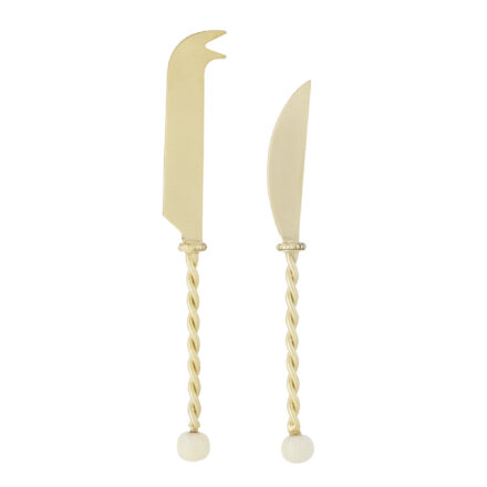 stainless/resin cheese knives amalia set 2 - gold/ivory statement piece decor displayed for interior styling.