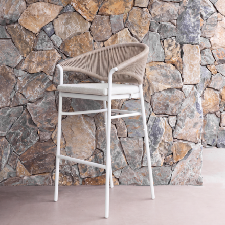 Celia Outdoor Bar Chair with powdercoated aluminium frame, handwoven PE wicker and Sunproof® seat cushion, available in three stylish colour combinations.