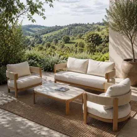 Harbour 4 Piece Outdoor Lounge Setting with teak look aluminium frame, handwoven HDPE wicker detailing and premium outdoor bouclé cushions surrounding a matching coffee table.